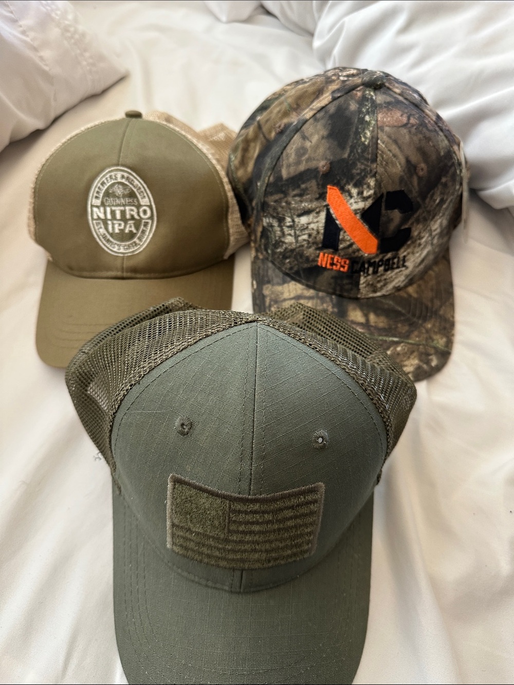 Lot if three baseball hats. neas Campbell is new with tags
